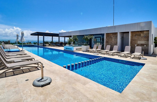 Cozy Apartment in Playa del Carmen | Game Room, Gym & Rooftop Pool | Great Amenities