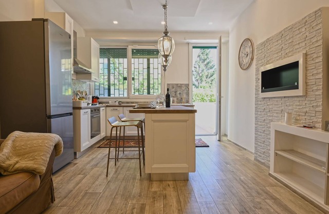 Cozy apartment with garden equipped with every comfort 10min from the center