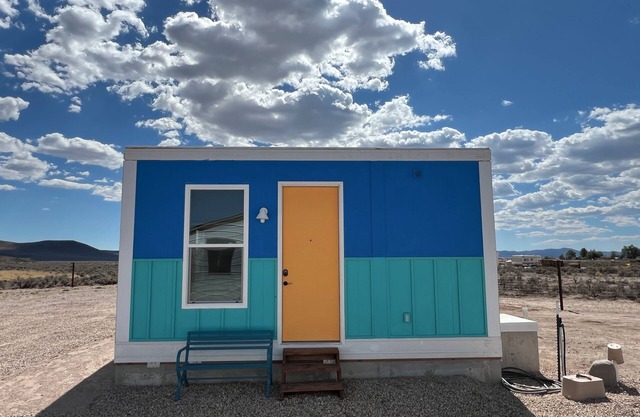 Cozy Beach House tiny home in tranquil Beryl Utah with AC, WiFi, fitness room.