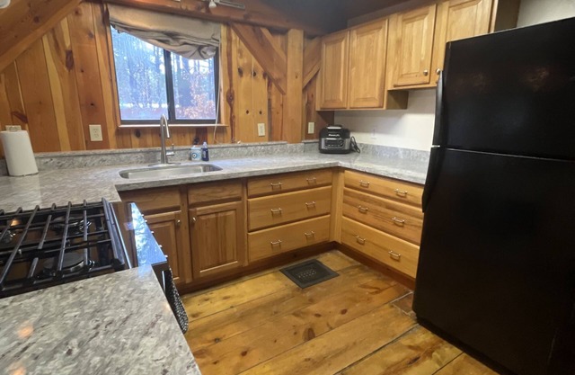 cozy cabin perfect to get away in the forest with your whole family .