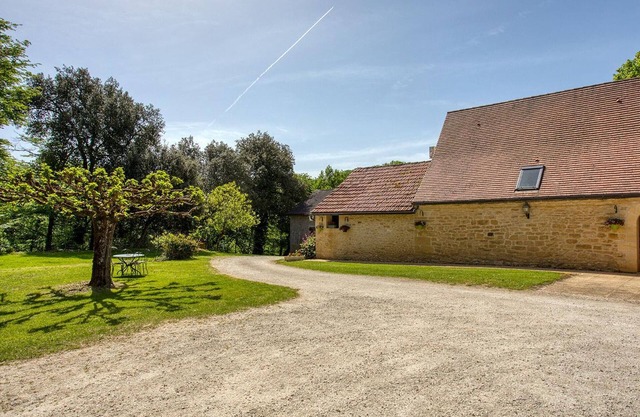Casa rural con jardín, barbacoa, WiFi, aire acondicionado y mascotas permitidas en el corazón de Dordogne