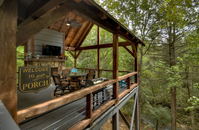 Cozy Creek welcomes pets to its tranquil waters, offering fishing, swimming, a hot tub, outdoor fireplace, fire-pit, and WiFi