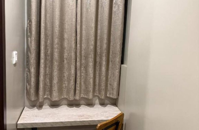 Cozy hotel suite with WiFi and AC in charming Bengaluru