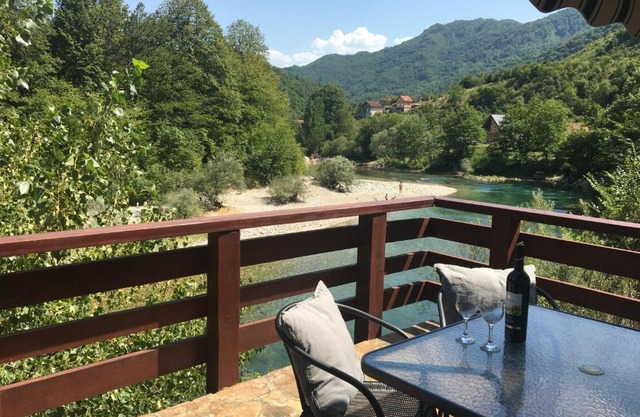 Cozy house next to river Neretva in nature