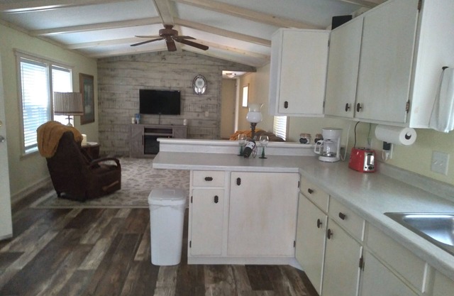 Cozy nestled in quiet neighborhood. On snowmobile and ATV trail.