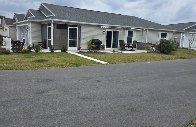 Cozy, new 2-bedroom, 2 bathroom home with 2-car garage on a corner lot.