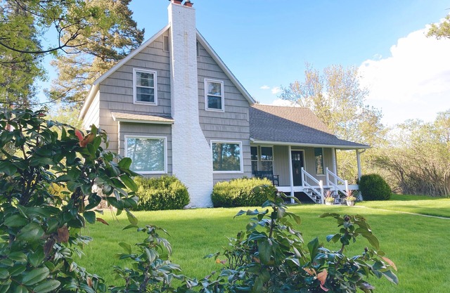 Cozy restored farmhouse on the river! Hot tub, wildlife, trails!