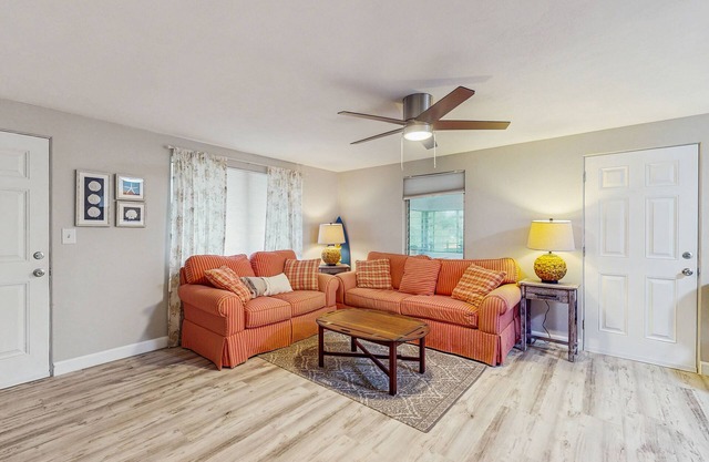 Cozy retreat with fenced yard, boat dock, and washer & dryer