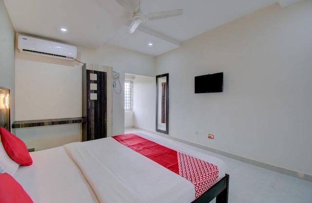 Acogedora y sencilla habitación clásica decorada en Kumbakonam
