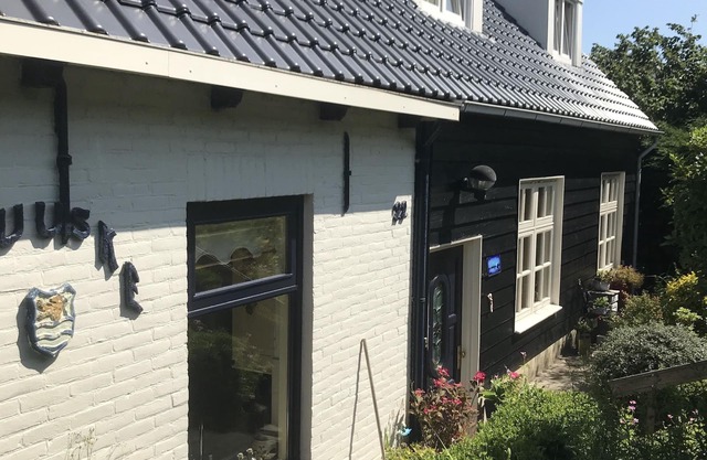 Acogedor apartamento soleado, 2 pax con gran jardín, cerca del mar de Grevelingen, WiFi