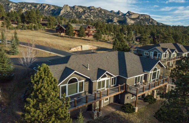 Cozy up in this spacious condo with two fireplaces, large deck, and hot tub!