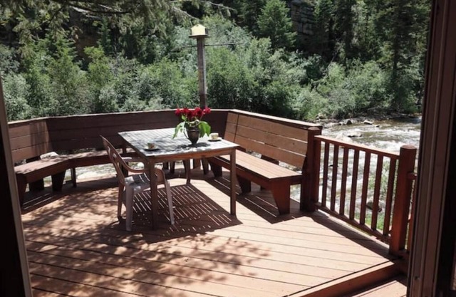 Create Memories at This Romantic Riverfront Cabin Near Estes Park