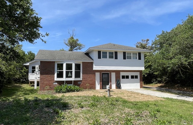 Cypress Cove, situated in Buxton on a soundfront lot, provides a peaceful setting in this charming rental cottage.