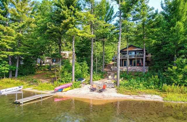 Deck & Fire Pit: Beachfront Home in Gaylord!