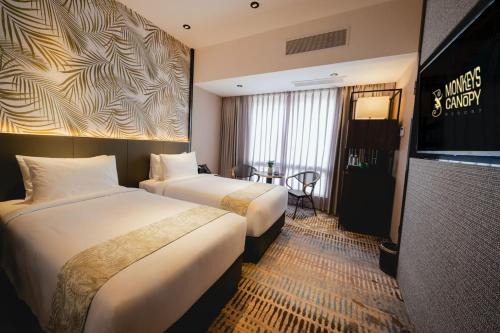 Deluxe King Room and Deluxe Twin Room at Monkeys Canopy Resort