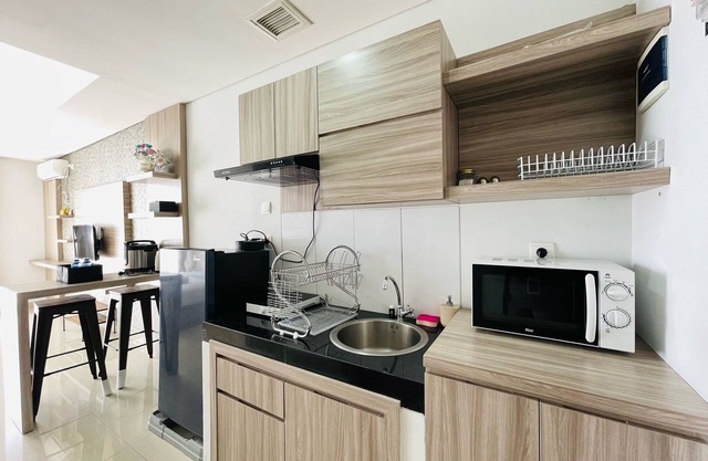 Deluxe Studio Room At Dago Suites Apartment