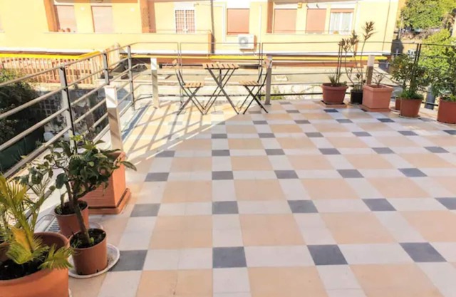 DISEÑO APTO Y TERRAZA POR PAREDES ROMANAS