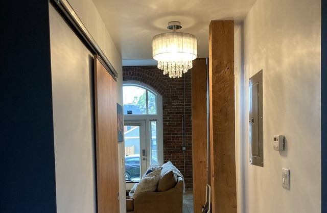Designer 1st floor loft style condo - great location