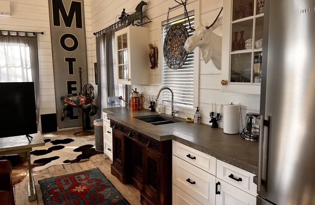 Designer one bedroom and loft stay amongst a working horse ranch.