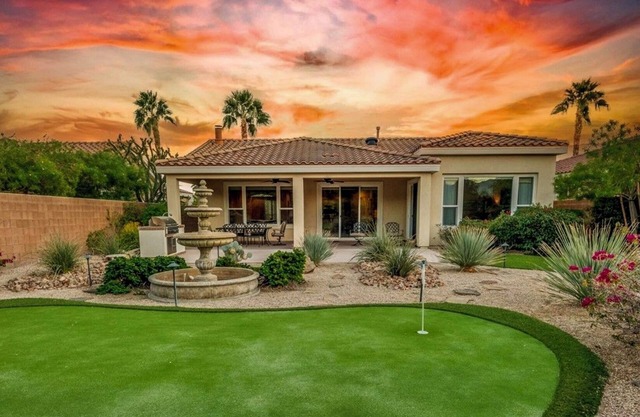 Desirable 2BR, 2BA house with breathtaking views, putting green, and golf cart!