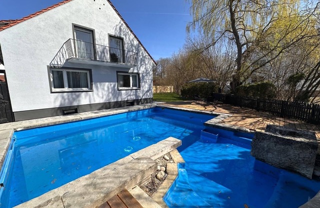 Detached house with private pool and garden.