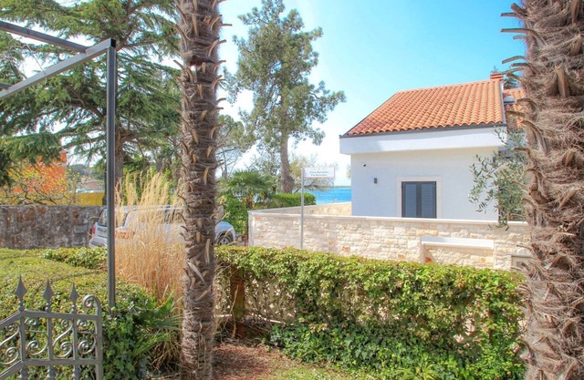 Directamente en el mar Adriático con jardín, barbacoa, terraza privada