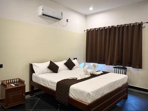 DIVINE BEACH INN - The sea shore hotel