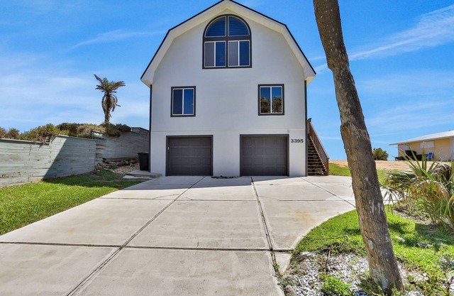 Dog-friendly beachfront home with beach access, decks, grill, fireplace, W/D, AC