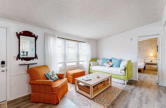 Dog-friendly, canal-front home with community pool & tennis, dock, & WiFi
