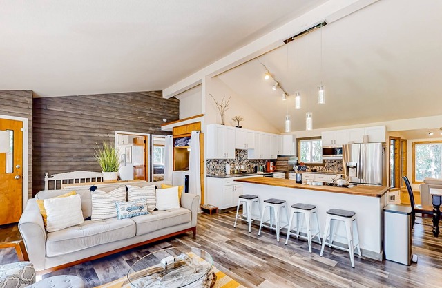 Dog-friendly, creekside home with hot tub, sauna & firepit - walk to the lake