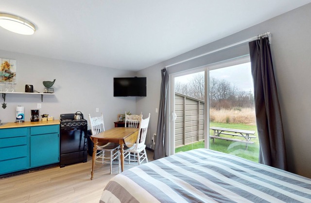 Dog-friendly, first-floor condo with hot tub - walk to the beach