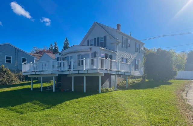 Dog-friendly home with a partial river view & deck - steps from park & beach