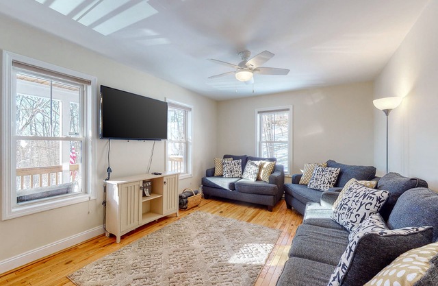 Dog-friendly home with large deck, AC, grill, fireplace & beach access