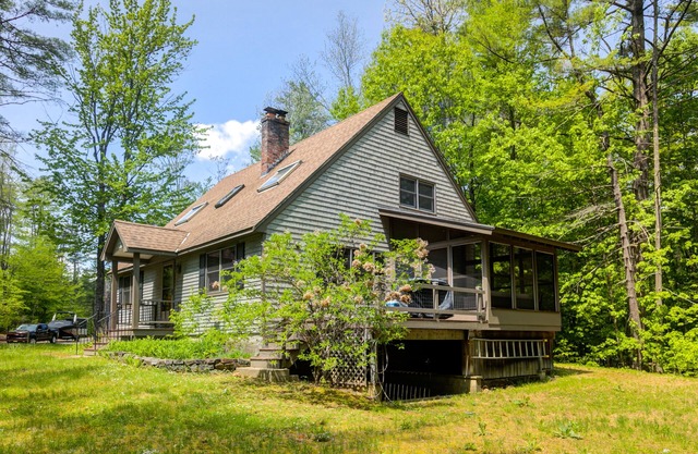 Dog-friendly home with firepit, screened porch, deck & association beach