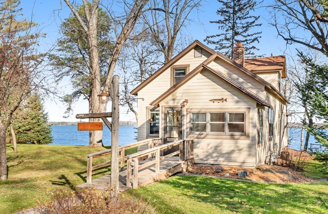 Dog-friendly lakefront home with fireplace, porch, water access, & rec room