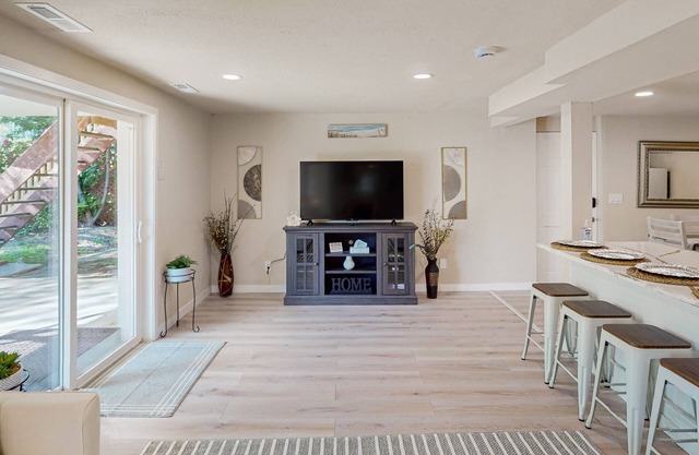 Dog-friendly lakefront getaway with a kitchenette, furnished patio, & fast WiFi