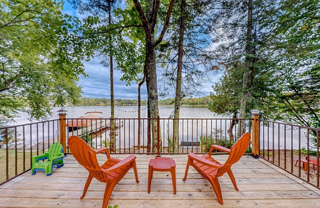 Dog-friendly lakefront home with a private beach, dock, firepit, & kayaks