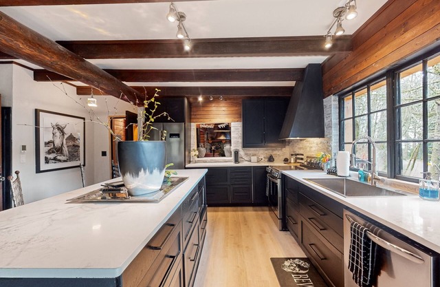 Dog-friendly mountain-view home with fireplace, deck, grill, streaming, & W/D