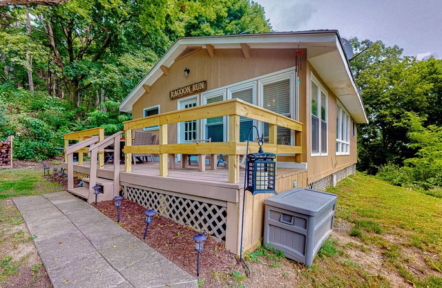 Dog-friendly retreat with close beach access, wood stove, deck, firepit, & AC