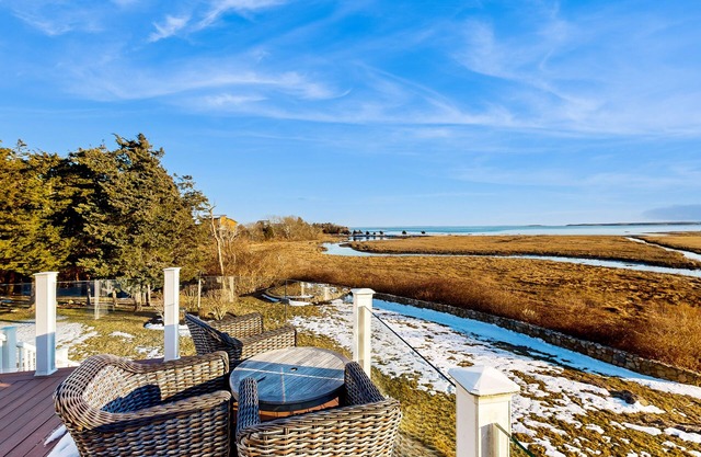 Dog-friendly waterfront home with hot tub, kayaks/bikes/SUPs, deck, & firepit