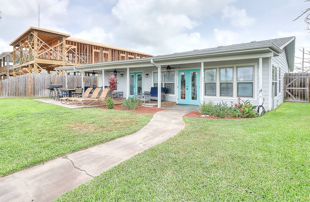 Dog-friendly, waterfront home with a dock, fast WiFi, central AC, & fenced yard