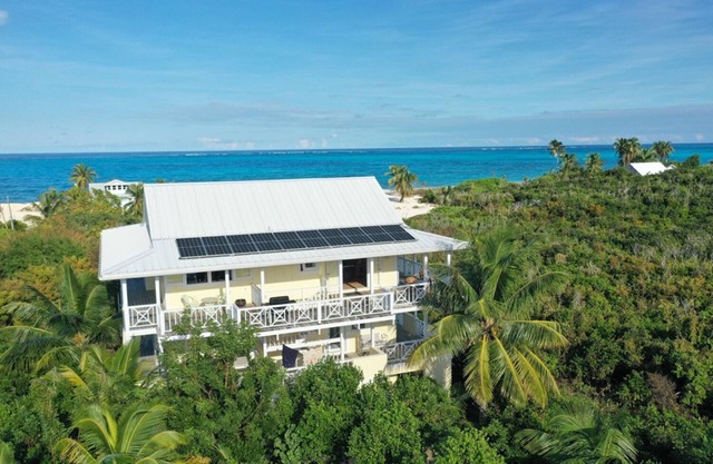 Don't worry... BEACH HAPPY! Man-O-War Cay. Your best-ever family beach vacation.