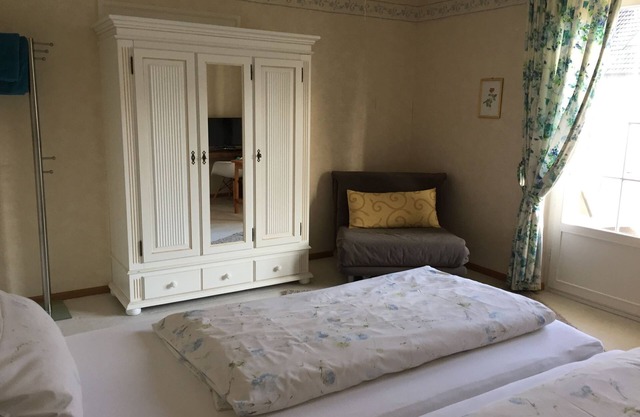 Double room with flat screen TV and shared bathroom