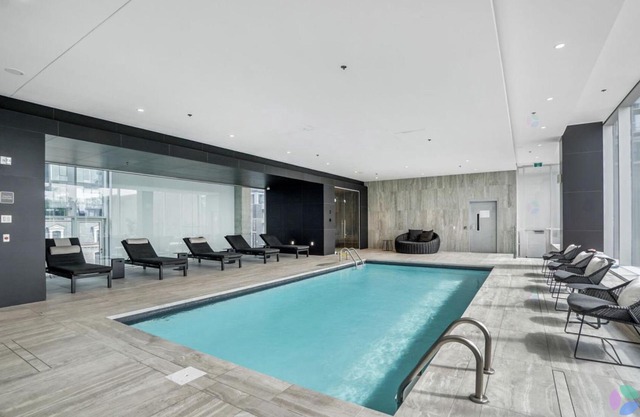 DOWNTOWN CORNER UNIT WITH VIEW WALKING DISTANCE TO EVERYTHING ( 30FT BALCONY )