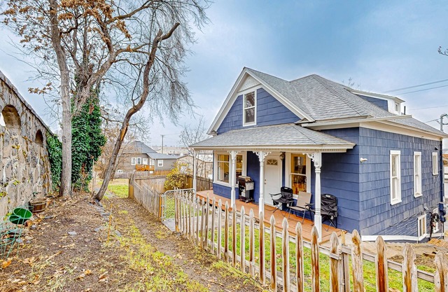 Downtown cottage with furnished porch, video games, central AC, & W/D
