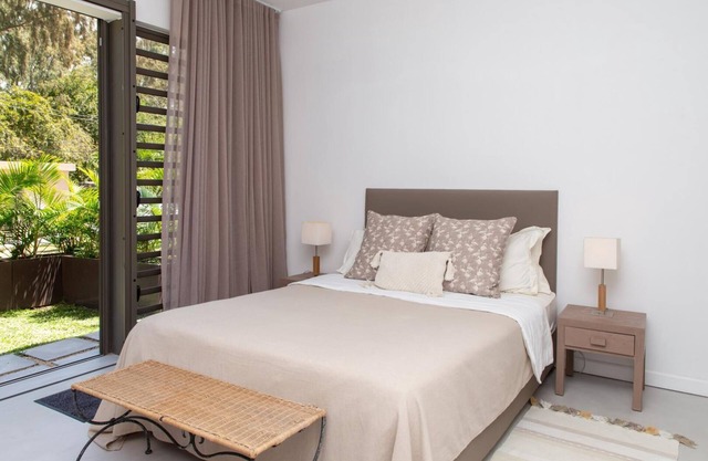 Duplex apartments with direct access to an almost private beach