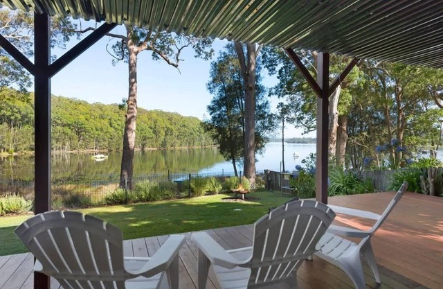 Dusky on Burrill, a stunning home located in the prime position of Burrill Lakes edge.