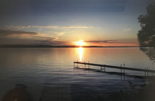 East Torch Lake cottage with beautiful sunsets!