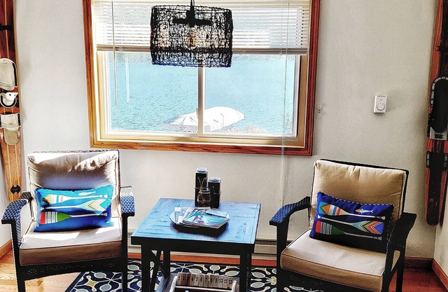 Eclectic getaway on Lake Tomahawk! Waterfront cabin by trails and downtown LT!