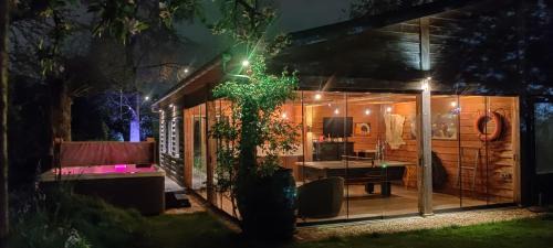 Ecolodge Tilburg met zwembad in groene oase bij centrum